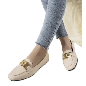 Beige moccasins with golden Hashtag decoration